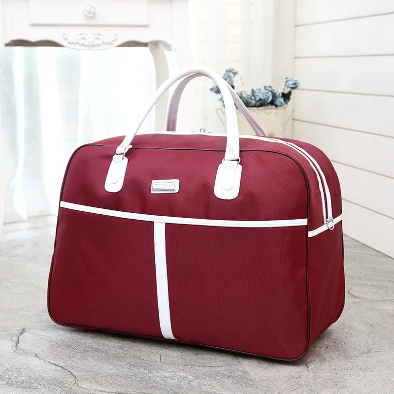 Large Capaci Travel Bag Women's Lightweight Pull Bag Portable ort Trip Hand Lage Bag with Wheels Faionable Ox Cloth